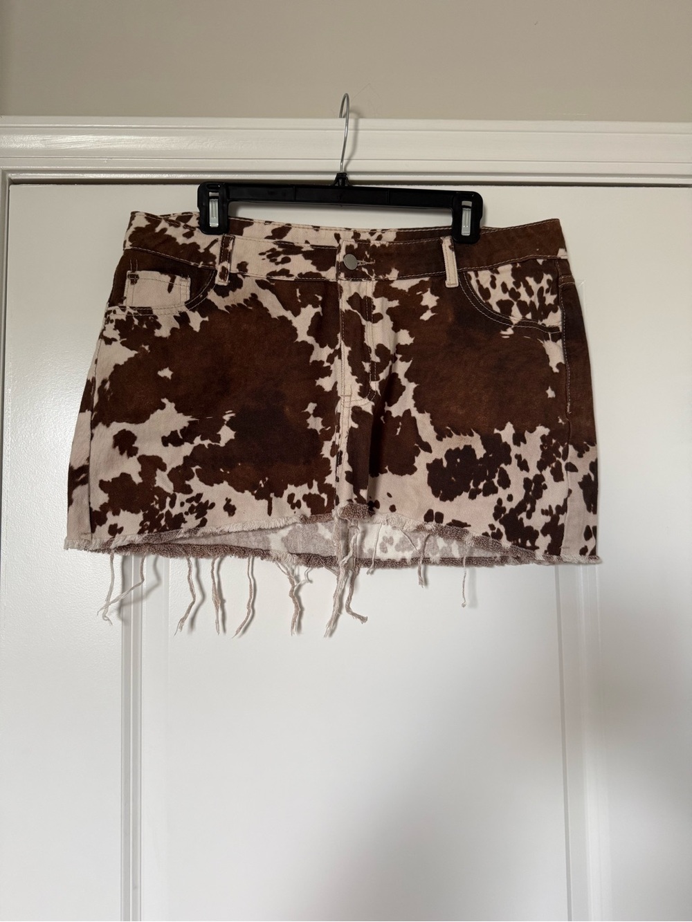 SHEIN Brown and Cream Cowprint Distressed Mini Skirt